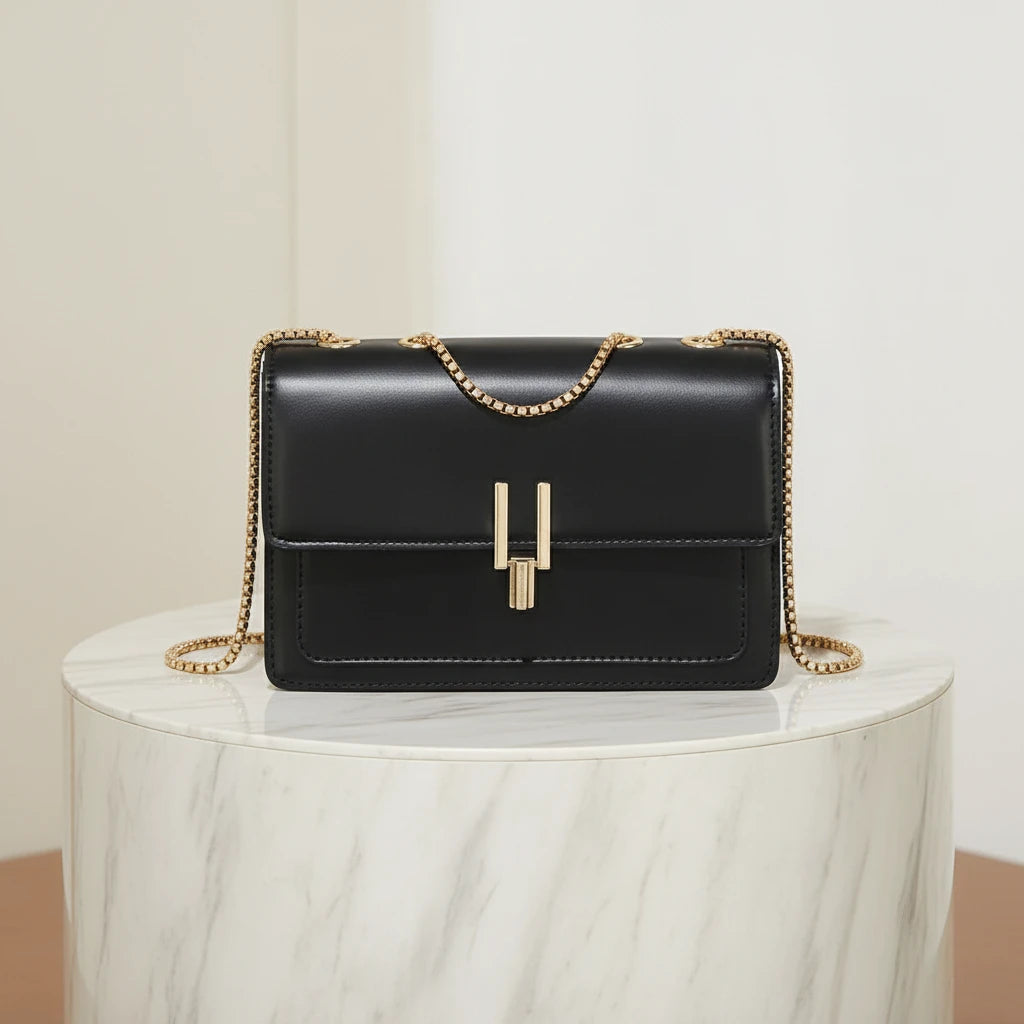 crossbody handbag with flip cover.